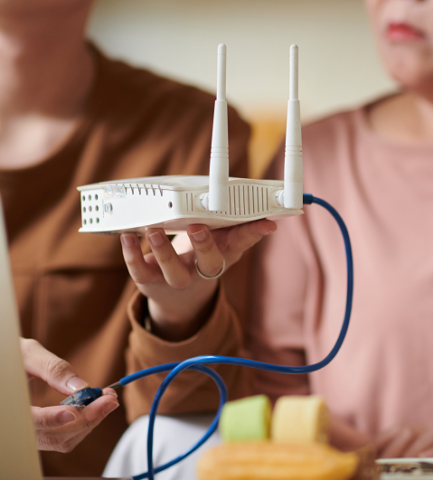 grandson-setting-up-wi-fi-router-2025-01-29-12-21-23-utc 1